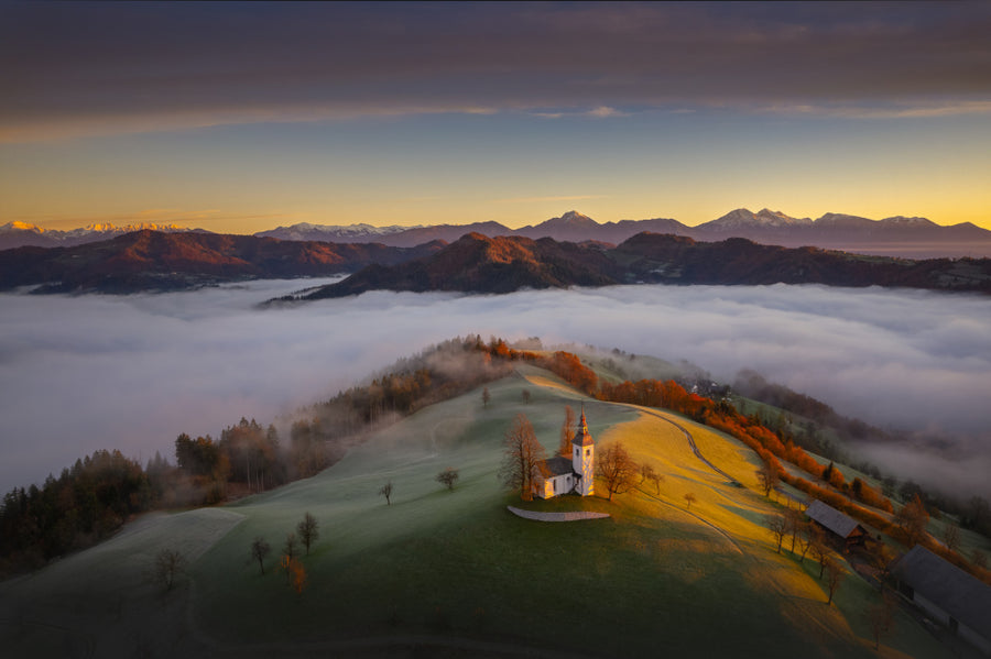 Church above foggy Valley archival giclée print by Ales Komovec
