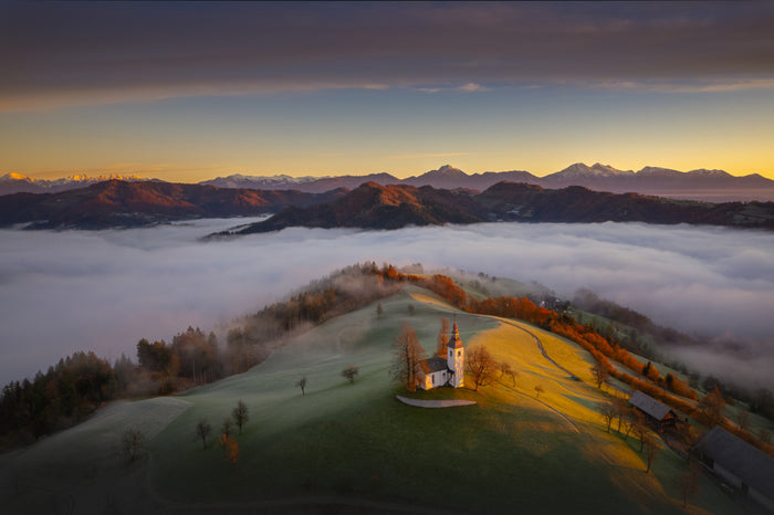 Church above foggy Valley archival giclée print by Ales Komovec